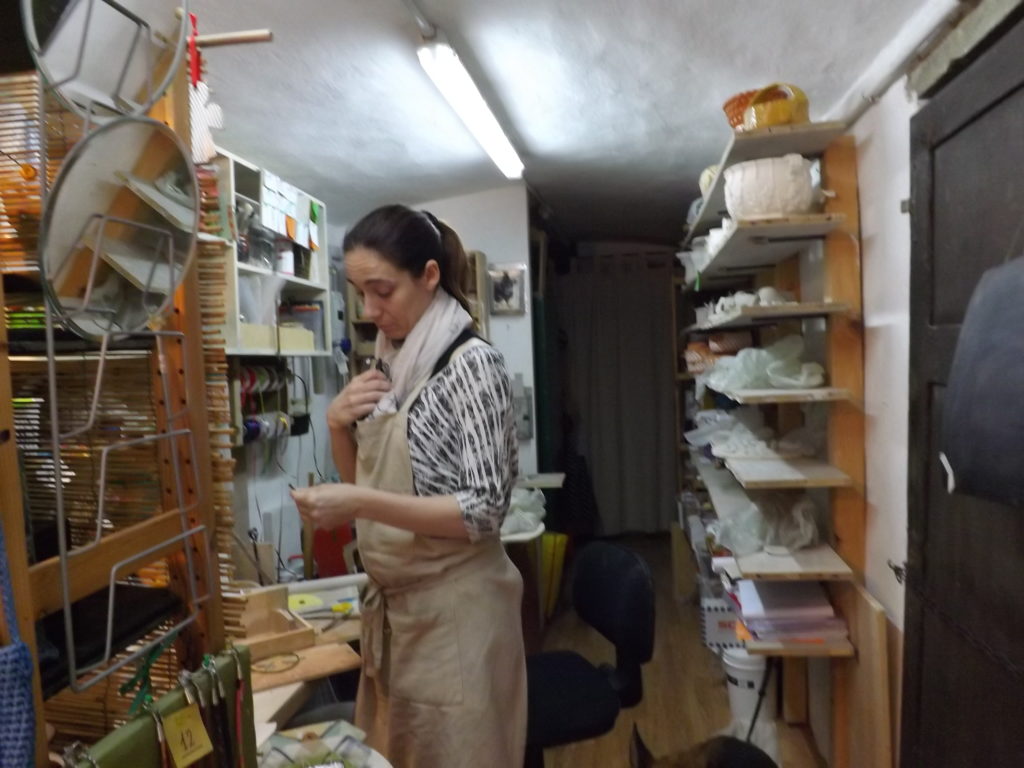 Artist Emmag Draghi in shop and studio, 52 Costa San Giorgio