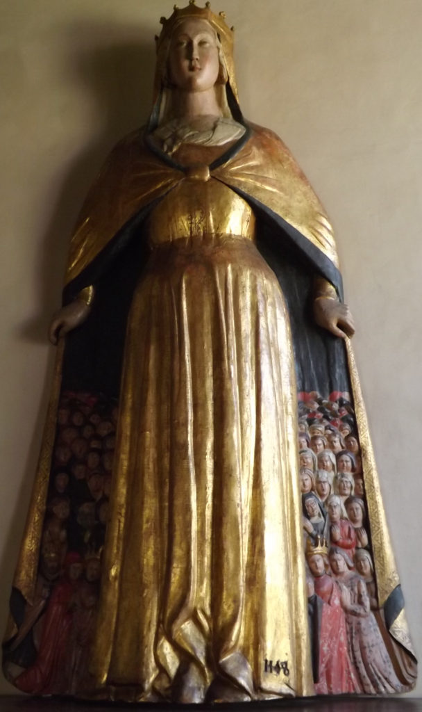 Mary protecting the faithful, bas relief